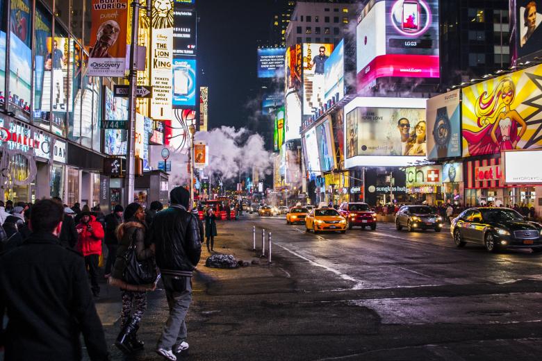 Street voting entry showing a public street scene with buildings and a roadway.